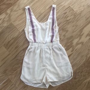Cream romper with pockets
